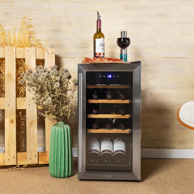 Cecotec Bolero GrandSommelier 1550 Inox Compressor Vinoteca con puerta y tirador inox de 15 botellas de capacidad con sistema compresor de enfriamiento temperatura regulable entre 5-18ºC y panel de control táctil. Vinoteca Última moda