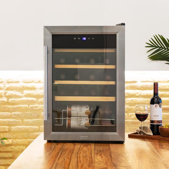 Cecotec Bolero GrandSommelier 2050 Inox Compressor Vinoteca con puerta y tirador inox de 20 botellas de capacidad con sistema compresor de enfriamiento temperatura regulable entre 5-18ºC y panel de control táctil. Vinoteca Ofertas de temporada
