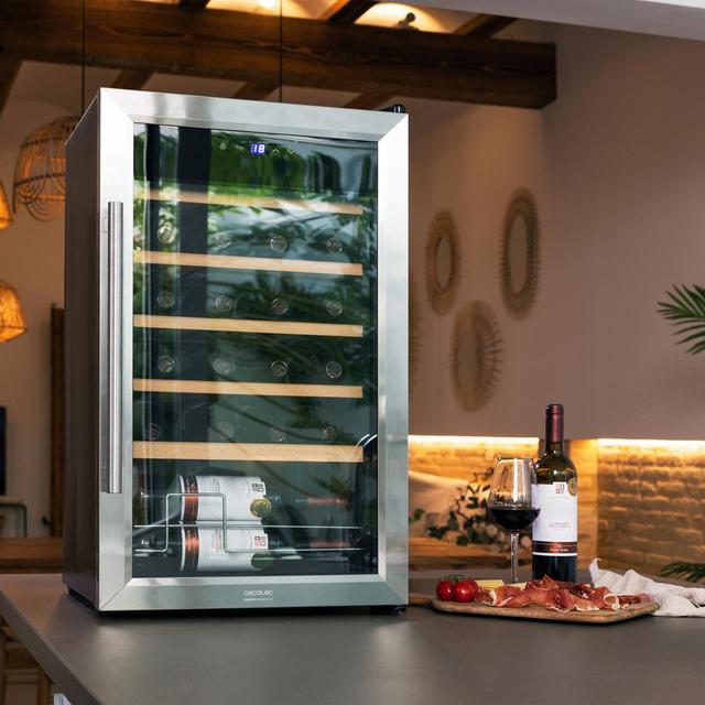 Cecotec Bolero GrandSommelier 2450 Inox Compressor Vinoteca con puerta y tirador inox de 24 botellas de capacidad con sistema compresor de enfriamiento temperatura regulable entre 5-18ºC y panel de control táctil. Vinoteca Grandes ahorros