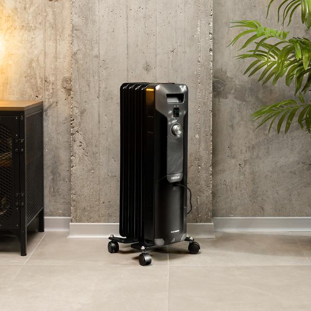 Cecotec Ready Warm 5000 Space Black Radiador de aceite de 5 módulos y 1000 W con 3 niveles de potencia cobertura de 12 m² recogecables control sencillo asa ruedas y doble sistema de seguridad. Radiador de aceite Últimos 2 días
