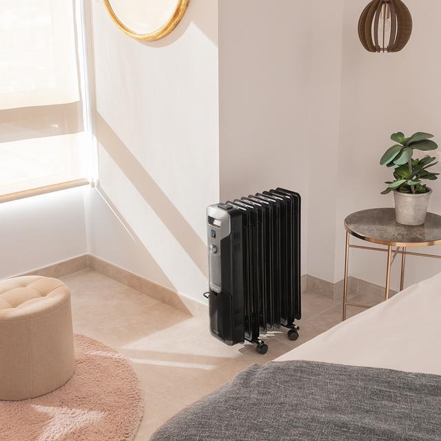 Cecotec ReadyWarm 9000 Space Black Radiador de aceite de 9 módulos y 2000W con 3 niveles de potencia cobertura de 20 m² recogecables control sencillo asa ruedas y doble sistema de seguridad. Radiador de aceite Devoluciones gratuitas