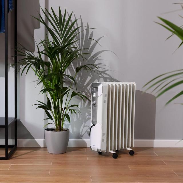 Cecotec ReadyWarm 9000 Space M. Radiador Eléctrico de Aceite con 9 Módulos Bajo Consumo 2000 W 3 Niveles Recogecables Sistema de Seguridad Ruedas 20 m2 Radiador de aceite 2025